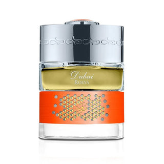 Flacone 50 ml di Spirit of Dubai Roeya EDP, elegante vetro con fascia arancione, fragranza unisex fresh-floral e legnosa.